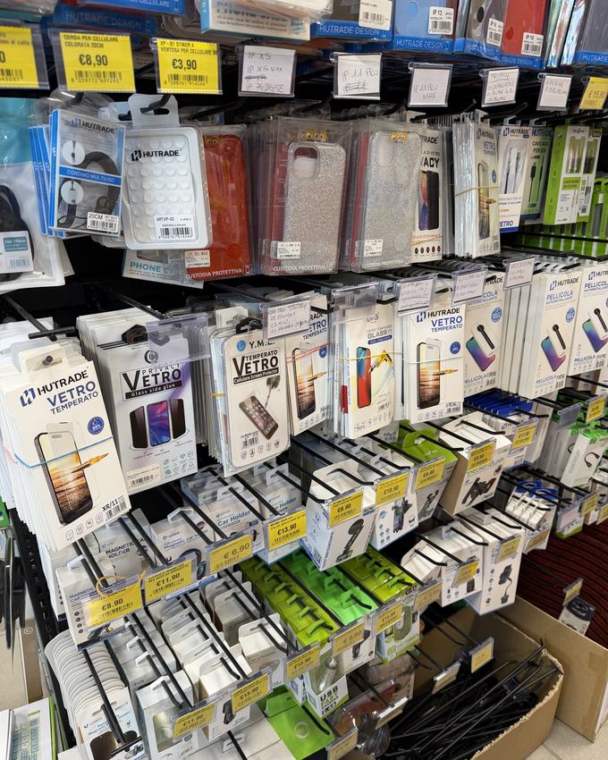 Wall of smartphone accessories with price tags